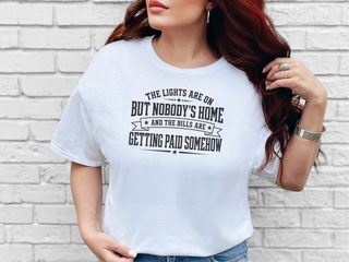 The Lights Are On But Nobody's Home…and The Bills Are Getting Paid Somehow funny shirt - photo 1