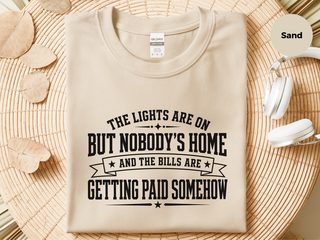The Lights Are On But Nobody's Home…and The Bills Are Getting Paid Somehow funny shirt - photo 5